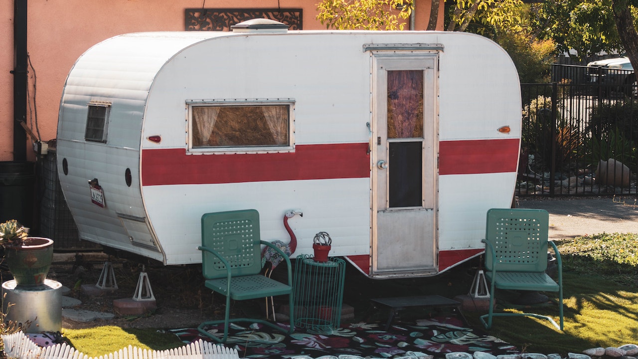 caravan with chairs outside